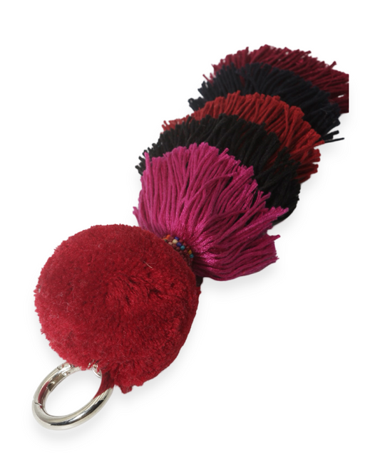Triple pompon bag charm
